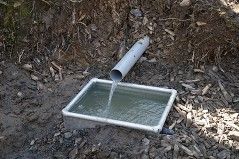 A dog drinking trough at the bottom of the track on Kilkhampton Common. This was installed to be used by dog walkers visiting the site.