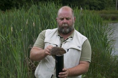 Derek Gow holding a water vole