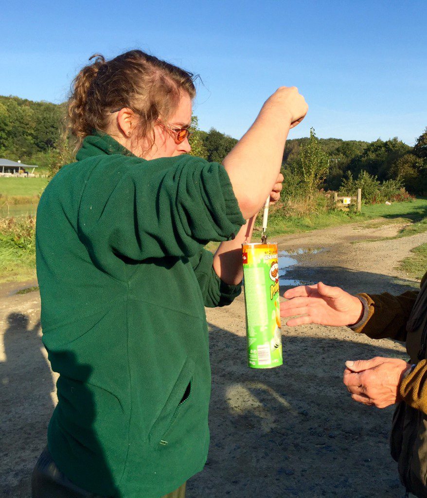 Westland Countryside Stewards Conservation Officier Teagen Hill weighing a water vole